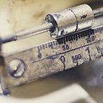 Close-up of an old scale.