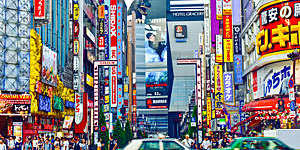Colourful signs adorn buildings in the Shinjuku area of Tokyo, Japan.